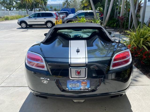 2008 Carbon Flash /Light Titanium Saturn Sky Red Line Carbon Flash SE 5 SPD (1G8MJ35X88Y) with an Turbocharged And Intercooled Ecotec 2.0L VVT DOHC 4-Cyl Aluminum Engine engine, Manual transmission, located at 4701 North Dixie Hwy, Pompano Beach, FL, 33064, (954) 422-2889, 26.240938, -80.123474 - OUR WEBPAGE FLORIDACARS1.COM HAS OVER 100 PHOTOS AND FREE CARFAX LINK 2008 Saturn SKY Red Line Carbon Flash SE Convertible 2.0L I4 F DOHC Gasoline 31 MPG Rear Wheel Drive Features ABS Brakes Air Conditioning Alloy Wheels AM/FM Stereo Auxiliary Audio Input CD Audio Cruise Control Leather Seats Manual - Photo#35