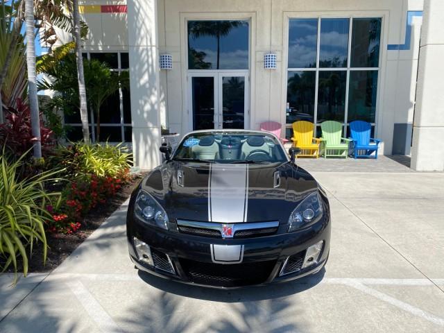 2008 Carbon Flash /Light Titanium Saturn Sky Red Line Carbon Flash SE 5 SPD (1G8MJ35X88Y) with an Turbocharged And Intercooled Ecotec 2.0L VVT DOHC 4-Cyl Aluminum Engine engine, Manual transmission, located at 4701 North Dixie Hwy, Pompano Beach, FL, 33064, (954) 422-2889, 26.240938, -80.123474 - OUR WEBPAGE FLORIDACARS1.COM HAS OVER 100 PHOTOS AND FREE CARFAX LINK 2008 Saturn SKY Red Line Carbon Flash SE Convertible 2.0L I4 F DOHC Gasoline 31 MPG Rear Wheel Drive Features ABS Brakes Air Conditioning Alloy Wheels AM/FM Stereo Auxiliary Audio Input CD Audio Cruise Control Leather Seats Manual - Photo#36