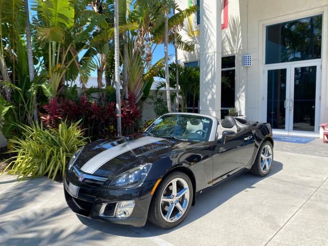 2008 Carbon Flash /Light Titanium Saturn Sky Red Line Carbon Flash SE 5 SPD (1G8MJ35X88Y) with an Turbocharged And Intercooled Ecotec 2.0L VVT DOHC 4-Cyl Aluminum Engine engine, Manual transmission, located at 4701 North Dixie Hwy, Pompano Beach, FL, 33064, (954) 422-2889, 26.240938, -80.123474 - OUR WEBPAGE FLORIDACARS1.COM HAS OVER 100 PHOTOS AND FREE CARFAX LINK 2008 Saturn SKY Red Line Carbon Flash SE Convertible 2.0L I4 F DOHC Gasoline 31 MPG Rear Wheel Drive Features ABS Brakes Air Conditioning Alloy Wheels AM/FM Stereo Auxiliary Audio Input CD Audio Cruise Control Leather Seats Manual - Photo#38