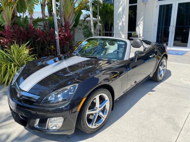 2008 Carbon Flash /Light Titanium Saturn Sky Red Line Carbon Flash SE 5 SPD (1G8MJ35X88Y) with an Turbocharged And Intercooled Ecotec 2.0L VVT DOHC 4-Cyl Aluminum Engine engine, Manual transmission, located at 4701 North Dixie Hwy, Pompano Beach, FL, 33064, (954) 422-2889, 26.240938, -80.123474 - OUR WEBPAGE FLORIDACARS1.COM HAS OVER 100 PHOTOS AND FREE CARFAX LINK 2008 Saturn SKY Red Line Carbon Flash SE Convertible 2.0L I4 F DOHC Gasoline 31 MPG Rear Wheel Drive Features ABS Brakes Air Conditioning Alloy Wheels AM/FM Stereo Auxiliary Audio Input CD Audio Cruise Control Leather Seats Manual - Photo#39