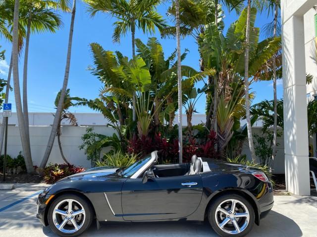 2008 Carbon Flash /Light Titanium Saturn Sky Red Line Carbon Flash SE 5 SPD (1G8MJ35X88Y) with an Turbocharged And Intercooled Ecotec 2.0L VVT DOHC 4-Cyl Aluminum Engine engine, Manual transmission, located at 4701 North Dixie Hwy, Pompano Beach, FL, 33064, (954) 422-2889, 26.240938, -80.123474 - OUR WEBPAGE FLORIDACARS1.COM HAS OVER 100 PHOTOS AND FREE CARFAX LINK 2008 Saturn SKY Red Line Carbon Flash SE Convertible 2.0L I4 F DOHC Gasoline 31 MPG Rear Wheel Drive Features ABS Brakes Air Conditioning Alloy Wheels AM/FM Stereo Auxiliary Audio Input CD Audio Cruise Control Leather Seats Manual - Photo#40