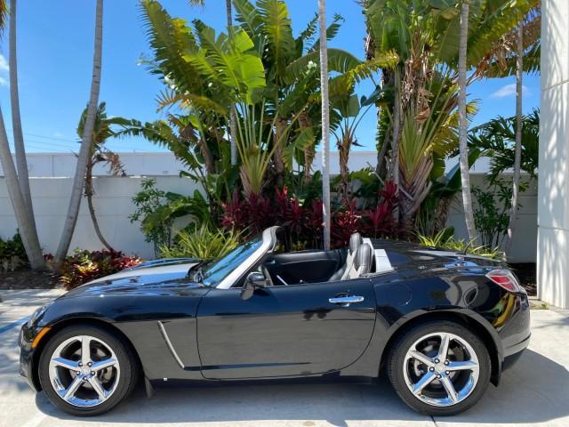2008 Carbon Flash /Light Titanium Saturn Sky Red Line Carbon Flash SE 5 SPD (1G8MJ35X88Y) with an Turbocharged And Intercooled Ecotec 2.0L VVT DOHC 4-Cyl Aluminum Engine engine, Manual transmission, located at 4701 North Dixie Hwy, Pompano Beach, FL, 33064, (954) 422-2889, 26.240938, -80.123474 - OUR WEBPAGE FLORIDACARS1.COM HAS OVER 100 PHOTOS AND FREE CARFAX LINK 2008 Saturn SKY Red Line Carbon Flash SE Convertible 2.0L I4 F DOHC Gasoline 31 MPG Rear Wheel Drive Features ABS Brakes Air Conditioning Alloy Wheels AM/FM Stereo Auxiliary Audio Input CD Audio Cruise Control Leather Seats Manual - Photo#41