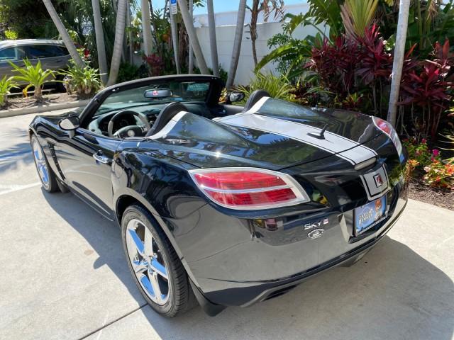 2008 Carbon Flash /Light Titanium Saturn Sky Red Line Carbon Flash SE 5 SPD (1G8MJ35X88Y) with an Turbocharged And Intercooled Ecotec 2.0L VVT DOHC 4-Cyl Aluminum Engine engine, Manual transmission, located at 4701 North Dixie Hwy, Pompano Beach, FL, 33064, (954) 422-2889, 26.240938, -80.123474 - OUR WEBPAGE FLORIDACARS1.COM HAS OVER 100 PHOTOS AND FREE CARFAX LINK 2008 Saturn SKY Red Line Carbon Flash SE Convertible 2.0L I4 F DOHC Gasoline 31 MPG Rear Wheel Drive Features ABS Brakes Air Conditioning Alloy Wheels AM/FM Stereo Auxiliary Audio Input CD Audio Cruise Control Leather Seats Manual - Photo#43