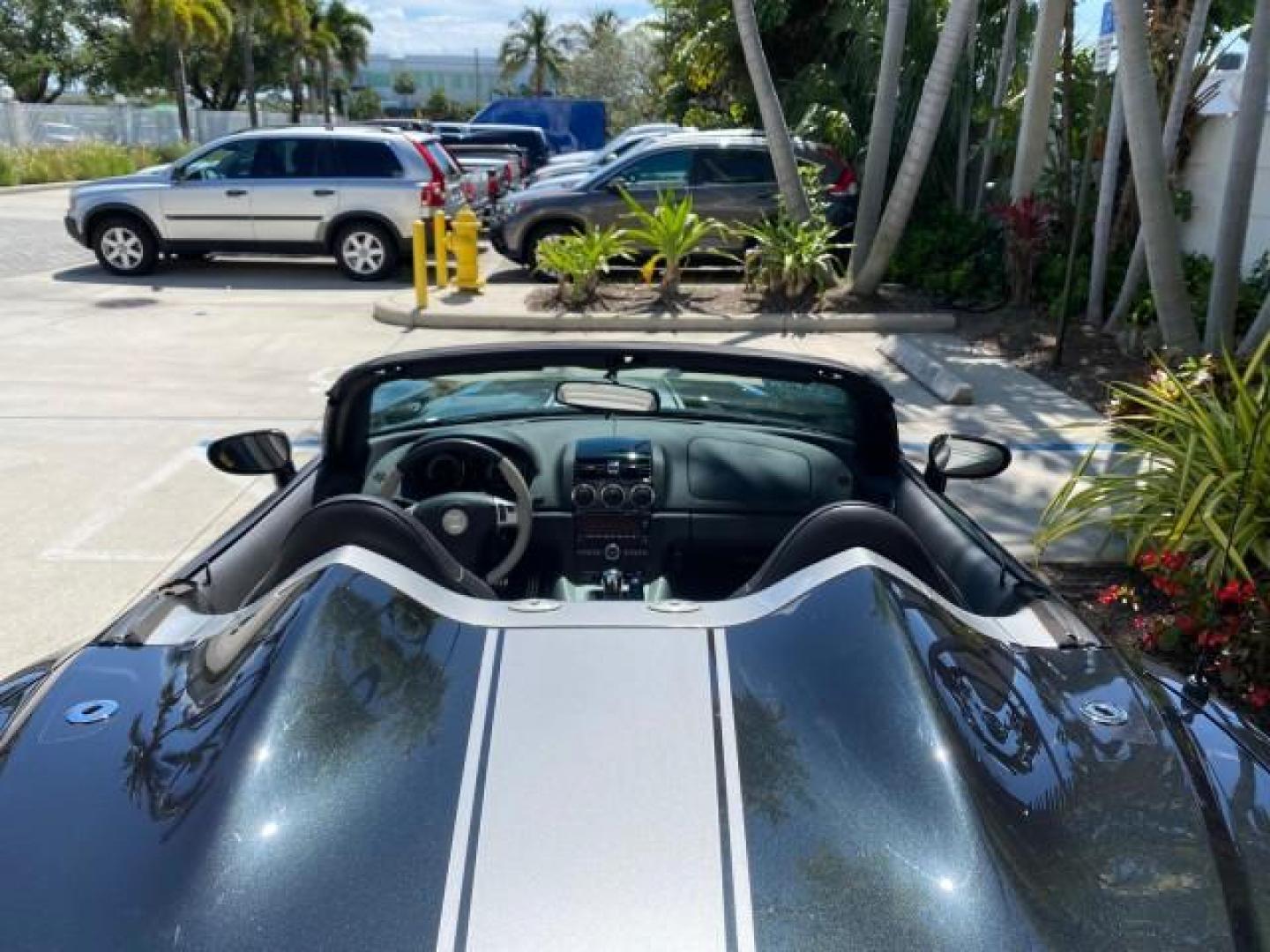 2008 Carbon Flash /Light Titanium Saturn Sky Red Line Carbon Flash SE 5 SPD (1G8MJ35X88Y) with an Turbocharged And Intercooled Ecotec 2.0L VVT DOHC 4-Cyl Aluminum Engine engine, Manual transmission, located at 4701 North Dixie Hwy, Pompano Beach, FL, 33064, (954) 422-2889, 26.240938, -80.123474 - OUR WEBPAGE FLORIDACARS1.COM HAS OVER 100 PHOTOS AND FREE CARFAX LINK 2008 Saturn SKY Red Line Carbon Flash SE Convertible 2.0L I4 F DOHC Gasoline 31 MPG Rear Wheel Drive Features ABS Brakes Air Conditioning Alloy Wheels AM/FM Stereo Auxiliary Audio Input CD Audio Cruise Control Leather Seats Manual - Photo#46