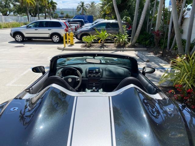 2008 Carbon Flash /Light Titanium Saturn Sky Red Line Carbon Flash SE 5 SPD (1G8MJ35X88Y) with an Turbocharged And Intercooled Ecotec 2.0L VVT DOHC 4-Cyl Aluminum Engine engine, Manual transmission, located at 4701 North Dixie Hwy, Pompano Beach, FL, 33064, (954) 422-2889, 26.240938, -80.123474 - OUR WEBPAGE FLORIDACARS1.COM HAS OVER 100 PHOTOS AND FREE CARFAX LINK 2008 Saturn SKY Red Line Carbon Flash SE Convertible 2.0L I4 F DOHC Gasoline 31 MPG Rear Wheel Drive Features ABS Brakes Air Conditioning Alloy Wheels AM/FM Stereo Auxiliary Audio Input CD Audio Cruise Control Leather Seats Manual - Photo#46
