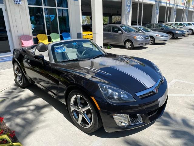 2008 Carbon Flash /Light Titanium Saturn Sky Red Line Carbon Flash SE 5 SPD (1G8MJ35X88Y) with an Turbocharged And Intercooled Ecotec 2.0L VVT DOHC 4-Cyl Aluminum Engine engine, Manual transmission, located at 4701 North Dixie Hwy, Pompano Beach, FL, 33064, (954) 422-2889, 26.240938, -80.123474 - OUR WEBPAGE FLORIDACARS1.COM HAS OVER 100 PHOTOS AND FREE CARFAX LINK 2008 Saturn SKY Red Line Carbon Flash SE Convertible 2.0L I4 F DOHC Gasoline 31 MPG Rear Wheel Drive Features ABS Brakes Air Conditioning Alloy Wheels AM/FM Stereo Auxiliary Audio Input CD Audio Cruise Control Leather Seats Manual - Photo#50