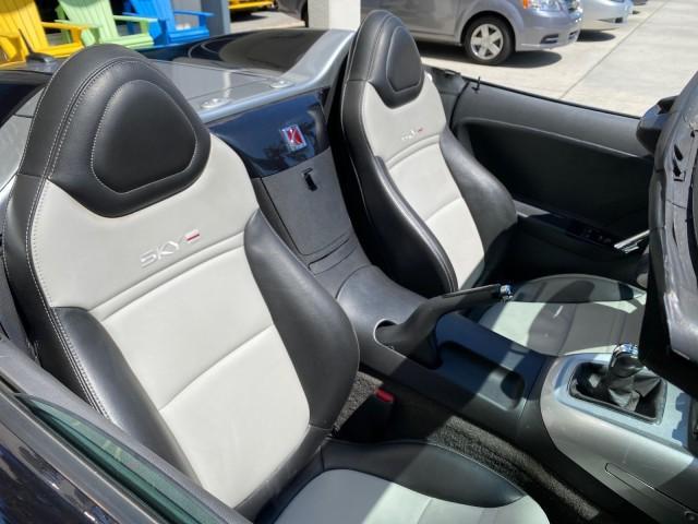 2008 Carbon Flash /Light Titanium Saturn Sky Red Line Carbon Flash SE 5 SPD (1G8MJ35X88Y) with an Turbocharged And Intercooled Ecotec 2.0L VVT DOHC 4-Cyl Aluminum Engine engine, Manual transmission, located at 4701 North Dixie Hwy, Pompano Beach, FL, 33064, (954) 422-2889, 26.240938, -80.123474 - OUR WEBPAGE FLORIDACARS1.COM HAS OVER 100 PHOTOS AND FREE CARFAX LINK 2008 Saturn SKY Red Line Carbon Flash SE Convertible 2.0L I4 F DOHC Gasoline 31 MPG Rear Wheel Drive Features ABS Brakes Air Conditioning Alloy Wheels AM/FM Stereo Auxiliary Audio Input CD Audio Cruise Control Leather Seats Manual - Photo#51