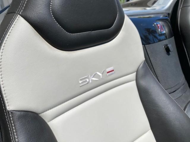 2008 Carbon Flash /Light Titanium Saturn Sky Red Line Carbon Flash SE 5 SPD (1G8MJ35X88Y) with an Turbocharged And Intercooled Ecotec 2.0L VVT DOHC 4-Cyl Aluminum Engine engine, Manual transmission, located at 4701 North Dixie Hwy, Pompano Beach, FL, 33064, (954) 422-2889, 26.240938, -80.123474 - OUR WEBPAGE FLORIDACARS1.COM HAS OVER 100 PHOTOS AND FREE CARFAX LINK 2008 Saturn SKY Red Line Carbon Flash SE Convertible 2.0L I4 F DOHC Gasoline 31 MPG Rear Wheel Drive Features ABS Brakes Air Conditioning Alloy Wheels AM/FM Stereo Auxiliary Audio Input CD Audio Cruise Control Leather Seats Manual - Photo#52