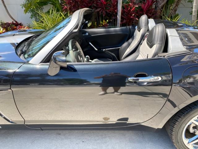 2008 Carbon Flash /Light Titanium Saturn Sky Red Line Carbon Flash SE 5 SPD (1G8MJ35X88Y) with an Turbocharged And Intercooled Ecotec 2.0L VVT DOHC 4-Cyl Aluminum Engine engine, Manual transmission, located at 4701 North Dixie Hwy, Pompano Beach, FL, 33064, (954) 422-2889, 26.240938, -80.123474 - OUR WEBPAGE FLORIDACARS1.COM HAS OVER 100 PHOTOS AND FREE CARFAX LINK 2008 Saturn SKY Red Line Carbon Flash SE Convertible 2.0L I4 F DOHC Gasoline 31 MPG Rear Wheel Drive Features ABS Brakes Air Conditioning Alloy Wheels AM/FM Stereo Auxiliary Audio Input CD Audio Cruise Control Leather Seats Manual - Photo#55
