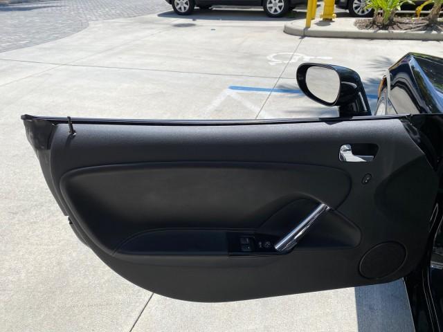 2008 Carbon Flash /Light Titanium Saturn Sky Red Line Carbon Flash SE 5 SPD (1G8MJ35X88Y) with an Turbocharged And Intercooled Ecotec 2.0L VVT DOHC 4-Cyl Aluminum Engine engine, Manual transmission, located at 4701 North Dixie Hwy, Pompano Beach, FL, 33064, (954) 422-2889, 26.240938, -80.123474 - OUR WEBPAGE FLORIDACARS1.COM HAS OVER 100 PHOTOS AND FREE CARFAX LINK 2008 Saturn SKY Red Line Carbon Flash SE Convertible 2.0L I4 F DOHC Gasoline 31 MPG Rear Wheel Drive Features ABS Brakes Air Conditioning Alloy Wheels AM/FM Stereo Auxiliary Audio Input CD Audio Cruise Control Leather Seats Manual - Photo#60