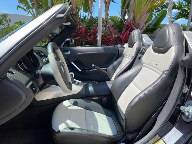 2008 Carbon Flash /Light Titanium Saturn Sky Red Line Carbon Flash SE 5 SPD (1G8MJ35X88Y) with an Turbocharged And Intercooled Ecotec 2.0L VVT DOHC 4-Cyl Aluminum Engine engine, Manual transmission, located at 4701 North Dixie Hwy, Pompano Beach, FL, 33064, (954) 422-2889, 26.240938, -80.123474 - OUR WEBPAGE FLORIDACARS1.COM HAS OVER 100 PHOTOS AND FREE CARFAX LINK 2008 Saturn SKY Red Line Carbon Flash SE Convertible 2.0L I4 F DOHC Gasoline 31 MPG Rear Wheel Drive Features ABS Brakes Air Conditioning Alloy Wheels AM/FM Stereo Auxiliary Audio Input CD Audio Cruise Control Leather Seats Manual - Photo#62