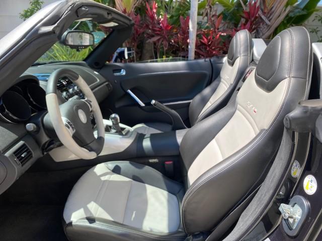 2008 Carbon Flash /Light Titanium Saturn Sky Red Line Carbon Flash SE 5 SPD (1G8MJ35X88Y) with an Turbocharged And Intercooled Ecotec 2.0L VVT DOHC 4-Cyl Aluminum Engine engine, Manual transmission, located at 4701 North Dixie Hwy, Pompano Beach, FL, 33064, (954) 422-2889, 26.240938, -80.123474 - OUR WEBPAGE FLORIDACARS1.COM HAS OVER 100 PHOTOS AND FREE CARFAX LINK 2008 Saturn SKY Red Line Carbon Flash SE Convertible 2.0L I4 F DOHC Gasoline 31 MPG Rear Wheel Drive Features ABS Brakes Air Conditioning Alloy Wheels AM/FM Stereo Auxiliary Audio Input CD Audio Cruise Control Leather Seats Manual - Photo#64
