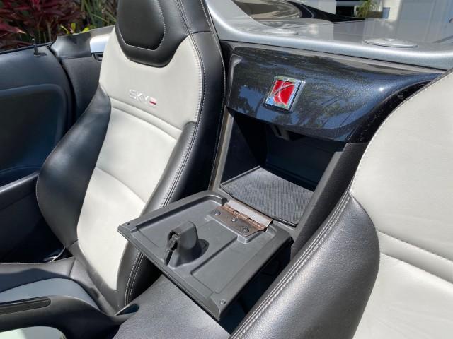 2008 Carbon Flash /Light Titanium Saturn Sky Red Line Carbon Flash SE 5 SPD (1G8MJ35X88Y) with an Turbocharged And Intercooled Ecotec 2.0L VVT DOHC 4-Cyl Aluminum Engine engine, Manual transmission, located at 4701 North Dixie Hwy, Pompano Beach, FL, 33064, (954) 422-2889, 26.240938, -80.123474 - OUR WEBPAGE FLORIDACARS1.COM HAS OVER 100 PHOTOS AND FREE CARFAX LINK 2008 Saturn SKY Red Line Carbon Flash SE Convertible 2.0L I4 F DOHC Gasoline 31 MPG Rear Wheel Drive Features ABS Brakes Air Conditioning Alloy Wheels AM/FM Stereo Auxiliary Audio Input CD Audio Cruise Control Leather Seats Manual - Photo#86