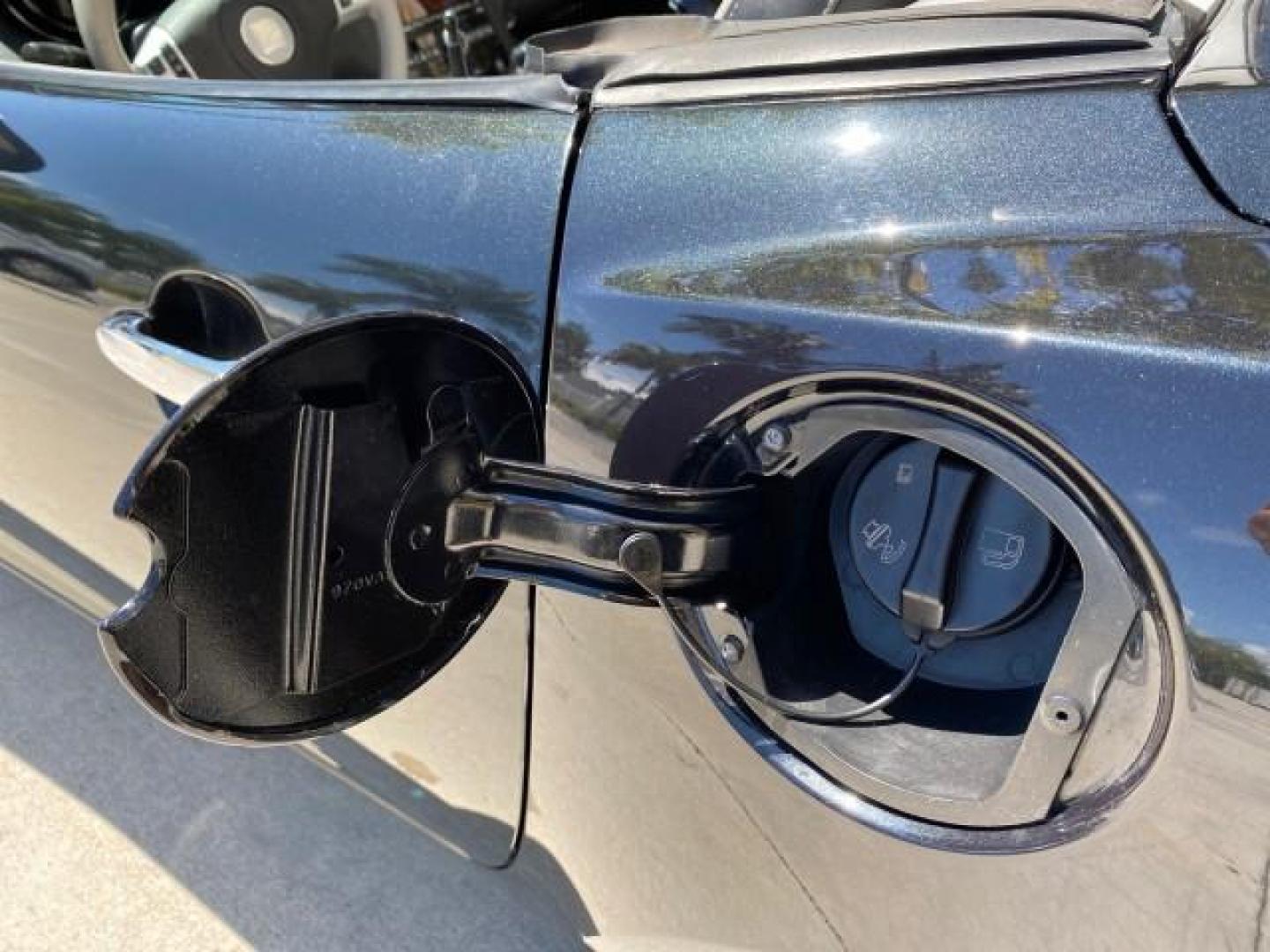 2008 Carbon Flash /Light Titanium Saturn Sky Red Line Carbon Flash SE 5 SPD (1G8MJ35X88Y) with an Turbocharged And Intercooled Ecotec 2.0L VVT DOHC 4-Cyl Aluminum Engine engine, Manual transmission, located at 4701 North Dixie Hwy, Pompano Beach, FL, 33064, (954) 422-2889, 26.240938, -80.123474 - OUR WEBPAGE FLORIDACARS1.COM HAS OVER 100 PHOTOS AND FREE CARFAX LINK 2008 Saturn SKY Red Line Carbon Flash SE Convertible 2.0L I4 F DOHC Gasoline 31 MPG Rear Wheel Drive Features ABS Brakes Air Conditioning Alloy Wheels AM/FM Stereo Auxiliary Audio Input CD Audio Cruise Control Leather Seats Manual - Photo#94