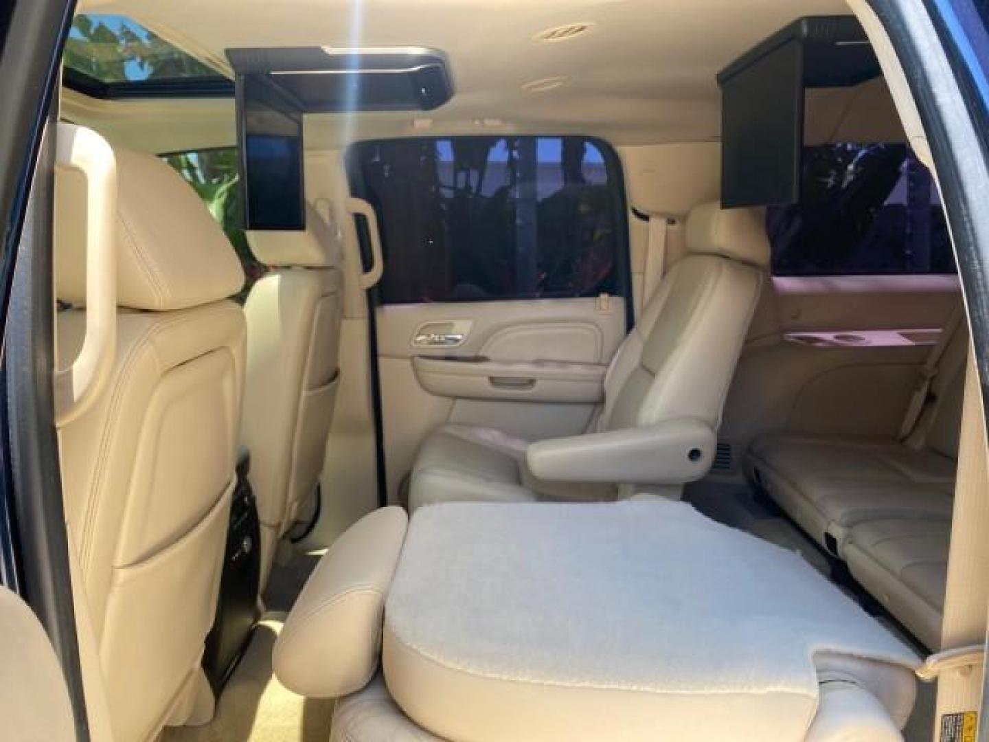 2007 Blue Chip /Cocoa/Very Light Cashmere Cadillac Escalade ESV SUNROOF AWD LOW MILES 47,118 (1GYFK66827R) with an 6.2L Vortec 1000 VVT V8 SFI Engine engine, Automatic transmission, located at 4701 North Dixie Hwy, Pompano Beach, FL, 33064, (954) 422-2889, 26.240938, -80.123474 - OUR WEBPAGE FLORIDACARS1.COM HAS OVER 100 PHOTOS AND FREE CARFAX LINK 2007 Cadillac Escalade ESV 4WD 4 Door Wagon/Sport Utility 6.2L V8 F Gasoline 19 MPG All Wheel Drive Features 20 Inch Plus Wheels 4WD/AWD A/C Seat(s) ABS Brakes Air Conditioning Alloy Wheels AM/FM Stereo Automatic Transmission Blue - Photo#88