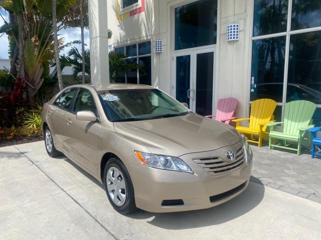 2009 Desert Sand Metallic /Bisque Toyota Camry LE LOW MILES 18,727 1 OWNER (4T1BE46K59U) with an 2.4L DOHC VVT-i 16-Valve 4-Cyl Engine engine, Automatic transmission, located at 4701 North Dixie Hwy, Pompano Beach, FL, 33064, (954) 422-2889, 26.240938, -80.123474 - OUR WEBPAGE FLORIDACARS1.COM HAS OVER 100 PHOTOS AND FREE CARFAX LINK 2009 Toyota Camry LE 1 OWNER Sedan 4 DR 2.4L I4 F DOHC 16V Gasoline 31 MPG Front Wheel Drive Features ABS Brakes Air Conditioning AM/FM Stereo Automatic Transmission Auxiliary Audio Input CD Audio Cruise Control Leather Seats Over - Photo#1