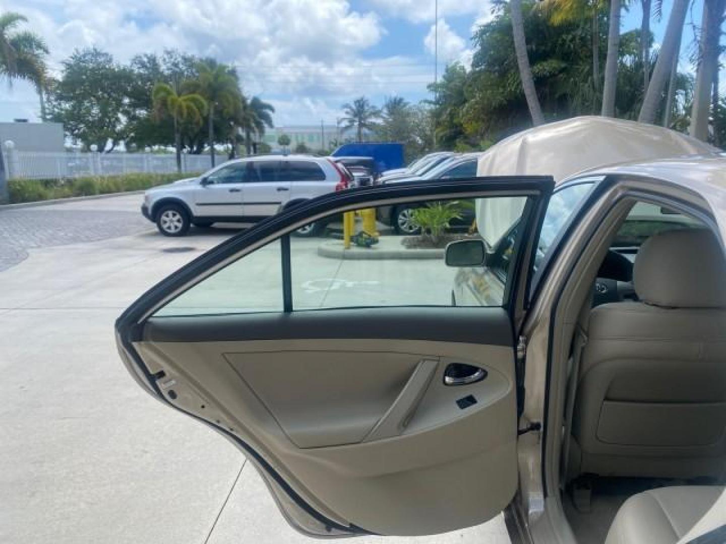 2009 Desert Sand Metallic /Bisque Toyota Camry LE LOW MILES 18,727 1 OWNER (4T1BE46K59U) with an 2.4L DOHC VVT-i 16-Valve 4-Cyl Engine engine, Automatic transmission, located at 4701 North Dixie Hwy, Pompano Beach, FL, 33064, (954) 422-2889, 26.240938, -80.123474 - OUR WEBPAGE FLORIDACARS1.COM HAS OVER 100 PHOTOS AND FREE CARFAX LINK 2009 Toyota Camry LE 1 OWNER Sedan 4 DR 2.4L I4 F DOHC 16V Gasoline 31 MPG Front Wheel Drive Features ABS Brakes Air Conditioning AM/FM Stereo Automatic Transmission Auxiliary Audio Input CD Audio Cruise Control Leather Seats Over - Photo#13