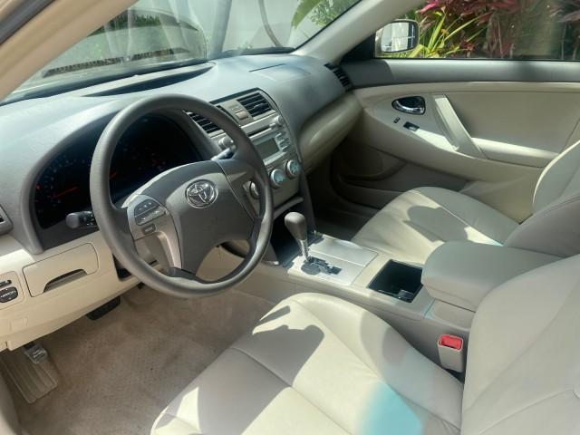 2009 Desert Sand Metallic /Bisque Toyota Camry LE LOW MILES 18,727 1 OWNER (4T1BE46K59U) with an 2.4L DOHC VVT-i 16-Valve 4-Cyl Engine engine, Automatic transmission, located at 4701 North Dixie Hwy, Pompano Beach, FL, 33064, (954) 422-2889, 26.240938, -80.123474 - OUR WEBPAGE FLORIDACARS1.COM HAS OVER 100 PHOTOS AND FREE CARFAX LINK 2009 Toyota Camry LE 1 OWNER Sedan 4 DR 2.4L I4 F DOHC 16V Gasoline 31 MPG Front Wheel Drive Features ABS Brakes Air Conditioning AM/FM Stereo Automatic Transmission Auxiliary Audio Input CD Audio Cruise Control Leather Seats Over - Photo#46
