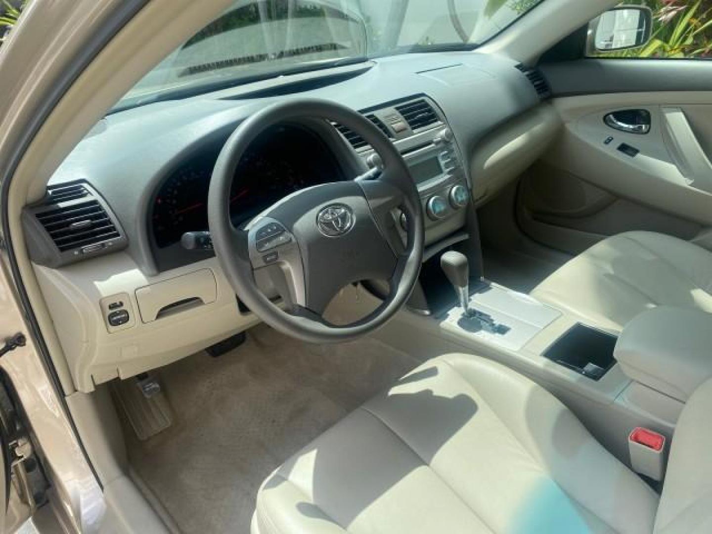 2009 Desert Sand Metallic /Bisque Toyota Camry LE LOW MILES 18,727 1 OWNER (4T1BE46K59U) with an 2.4L DOHC VVT-i 16-Valve 4-Cyl Engine engine, Automatic transmission, located at 4701 North Dixie Hwy, Pompano Beach, FL, 33064, (954) 422-2889, 26.240938, -80.123474 - OUR WEBPAGE FLORIDACARS1.COM HAS OVER 100 PHOTOS AND FREE CARFAX LINK 2009 Toyota Camry LE 1 OWNER Sedan 4 DR 2.4L I4 F DOHC 16V Gasoline 31 MPG Front Wheel Drive Features ABS Brakes Air Conditioning AM/FM Stereo Automatic Transmission Auxiliary Audio Input CD Audio Cruise Control Leather Seats Over - Photo#48