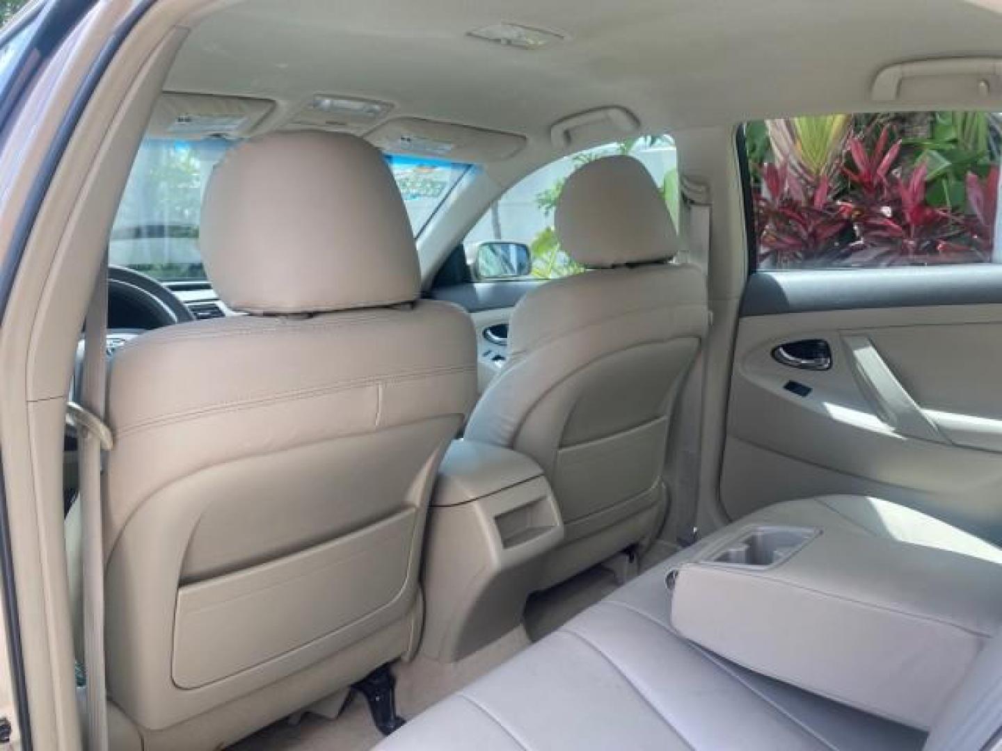 2009 Desert Sand Metallic /Bisque Toyota Camry LE LOW MILES 18,727 1 OWNER (4T1BE46K59U) with an 2.4L DOHC VVT-i 16-Valve 4-Cyl Engine engine, Automatic transmission, located at 4701 North Dixie Hwy, Pompano Beach, FL, 33064, (954) 422-2889, 26.240938, -80.123474 - OUR WEBPAGE FLORIDACARS1.COM HAS OVER 100 PHOTOS AND FREE CARFAX LINK 2009 Toyota Camry LE 1 OWNER Sedan 4 DR 2.4L I4 F DOHC 16V Gasoline 31 MPG Front Wheel Drive Features ABS Brakes Air Conditioning AM/FM Stereo Automatic Transmission Auxiliary Audio Input CD Audio Cruise Control Leather Seats Over - Photo#79