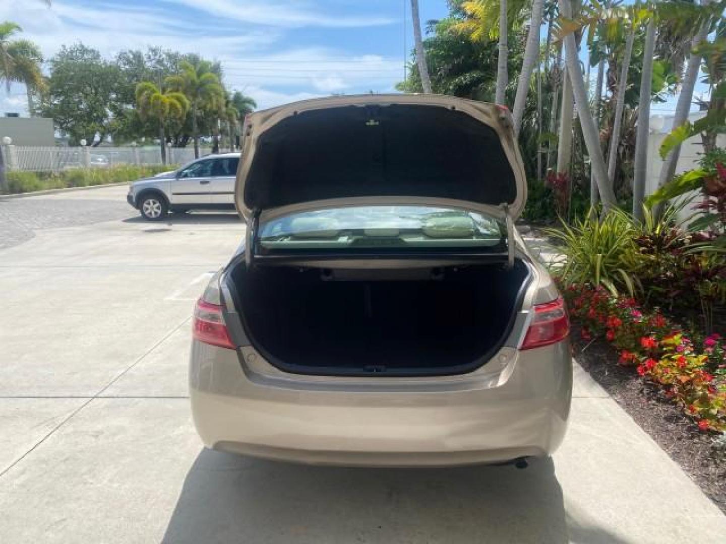 2009 Desert Sand Metallic /Bisque Toyota Camry LE LOW MILES 18,727 1 OWNER (4T1BE46K59U) with an 2.4L DOHC VVT-i 16-Valve 4-Cyl Engine engine, Automatic transmission, located at 4701 North Dixie Hwy, Pompano Beach, FL, 33064, (954) 422-2889, 26.240938, -80.123474 - OUR WEBPAGE FLORIDACARS1.COM HAS OVER 100 PHOTOS AND FREE CARFAX LINK 2009 Toyota Camry LE 1 OWNER Sedan 4 DR 2.4L I4 F DOHC 16V Gasoline 31 MPG Front Wheel Drive Features ABS Brakes Air Conditioning AM/FM Stereo Automatic Transmission Auxiliary Audio Input CD Audio Cruise Control Leather Seats Over - Photo#91