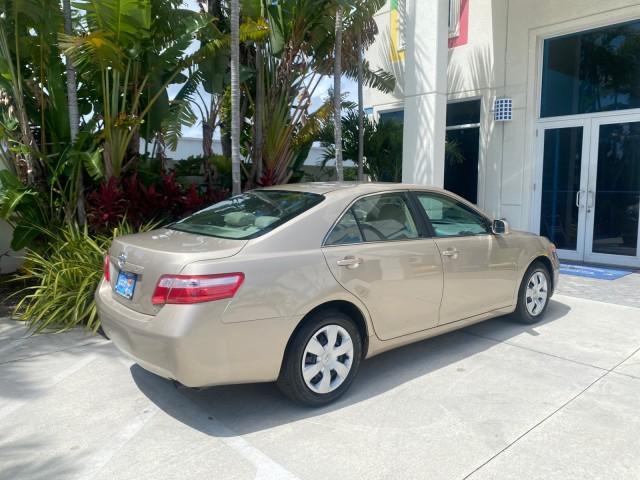 2009 Desert Sand Metallic /Bisque Toyota Camry LE LOW MILES 18,727 1 OWNER (4T1BE46K59U) with an 2.4L DOHC VVT-i 16-Valve 4-Cyl Engine engine, Automatic transmission, located at 4701 North Dixie Hwy, Pompano Beach, FL, 33064, (954) 422-2889, 26.240938, -80.123474 - OUR WEBPAGE FLORIDACARS1.COM HAS OVER 100 PHOTOS AND FREE CARFAX LINK 2009 Toyota Camry LE 1 OWNER Sedan 4 DR 2.4L I4 F DOHC 16V Gasoline 31 MPG Front Wheel Drive Features ABS Brakes Air Conditioning AM/FM Stereo Automatic Transmission Auxiliary Audio Input CD Audio Cruise Control Leather Seats Over - Photo#97