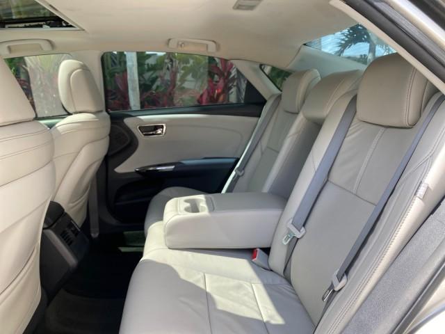 2013 Champagne Mica /Light Gray Toyota Avalon XLE Premium LOW MILES 56,196 (4T1BK1EB6DU) with an 3.5L DOHC EFI 24-Valve V6 Engine engine, Automatic transmission, located at 4701 North Dixie Hwy, Pompano Beach, FL, 33064, (954) 422-2889, 26.240938, -80.123474 - OUR WEBPAGE FLORIDACARS1.COM HAS OVER 100 PHOTOS AND FREE CARFAX LINK 2013 Toyota Avalon XLE Sedan 4 DR 3.5L V6 F DOHC 24V Gasoline 31 MPG Front Wheel Drive Features ABS Brakes Air Conditioning Alloy Wheels AM/FM Stereo Automatic Transmission Auxiliary Audio Input Bluetooth Technology CD Audio Cruis - Photo#79