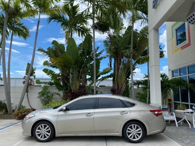2013 Champagne Mica /Light Gray Toyota Avalon XLE Premium LOW MILES 56,196 (4T1BK1EB6DU) with an 3.5L DOHC EFI 24-Valve V6 Engine engine, Automatic transmission, located at 4701 North Dixie Hwy, Pompano Beach, FL, 33064, (954) 422-2889, 26.240938, -80.123474 - OUR WEBPAGE FLORIDACARS1.COM HAS OVER 100 PHOTOS AND FREE CARFAX LINK 2013 Toyota Avalon XLE Sedan 4 DR 3.5L V6 F DOHC 24V Gasoline 31 MPG Front Wheel Drive Features ABS Brakes Air Conditioning Alloy Wheels AM/FM Stereo Automatic Transmission Auxiliary Audio Input Bluetooth Technology CD Audio Cruis- Photo#4