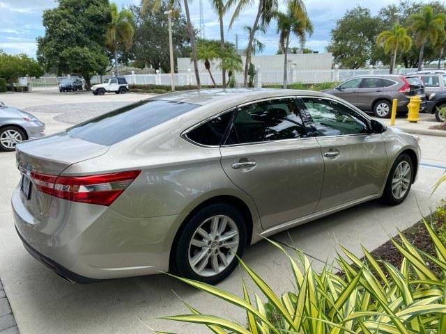 2013 Champagne Mica /Light Gray Toyota Avalon XLE Premium LOW MILES 56,196 (4T1BK1EB6DU) with an 3.5L DOHC EFI 24-Valve V6 Engine engine, Automatic transmission, located at 4701 North Dixie Hwy, Pompano Beach, FL, 33064, (954) 422-2889, 26.240938, -80.123474 - OUR WEBPAGE FLORIDACARS1.COM HAS OVER 100 PHOTOS AND FREE CARFAX LINK 2013 Toyota Avalon XLE Sedan 4 DR 3.5L V6 F DOHC 24V Gasoline 31 MPG Front Wheel Drive Features ABS Brakes Air Conditioning Alloy Wheels AM/FM Stereo Automatic Transmission Auxiliary Audio Input Bluetooth Technology CD Audio Cruis- Photo#7