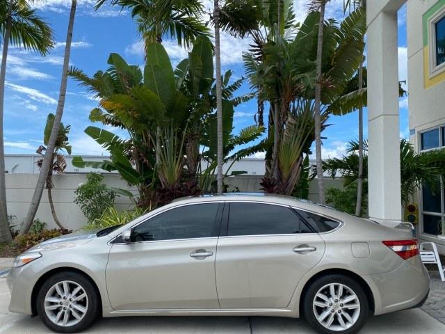 2013 Champagne Mica /Light Gray Toyota Avalon XLE Premium LOW MILES 56,196 (4T1BK1EB6DU) with an 3.5L DOHC EFI 24-Valve V6 Engine engine, Automatic transmission, located at 4701 North Dixie Hwy, Pompano Beach, FL, 33064, (954) 422-2889, 26.240938, -80.123474 - OUR WEBPAGE FLORIDACARS1.COM HAS OVER 100 PHOTOS AND FREE CARFAX LINK 2013 Toyota Avalon XLE Sedan 4 DR 3.5L V6 F DOHC 24V Gasoline 31 MPG Front Wheel Drive Features ABS Brakes Air Conditioning Alloy Wheels AM/FM Stereo Automatic Transmission Auxiliary Audio Input Bluetooth Technology CD Audio Cruis- Photo#31