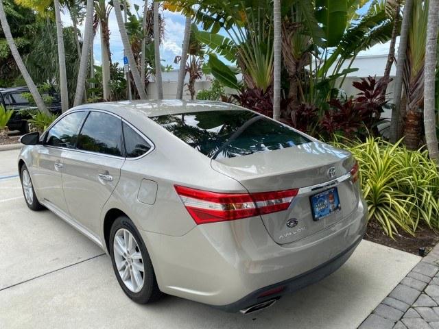 2013 Champagne Mica /Light Gray Toyota Avalon XLE Premium LOW MILES 56,196 (4T1BK1EB6DU) with an 3.5L DOHC EFI 24-Valve V6 Engine engine, Automatic transmission, located at 4701 North Dixie Hwy, Pompano Beach, FL, 33064, (954) 422-2889, 26.240938, -80.123474 - OUR WEBPAGE FLORIDACARS1.COM HAS OVER 100 PHOTOS AND FREE CARFAX LINK 2013 Toyota Avalon XLE Sedan 4 DR 3.5L V6 F DOHC 24V Gasoline 31 MPG Front Wheel Drive Features ABS Brakes Air Conditioning Alloy Wheels AM/FM Stereo Automatic Transmission Auxiliary Audio Input Bluetooth Technology CD Audio Cruis- Photo#33