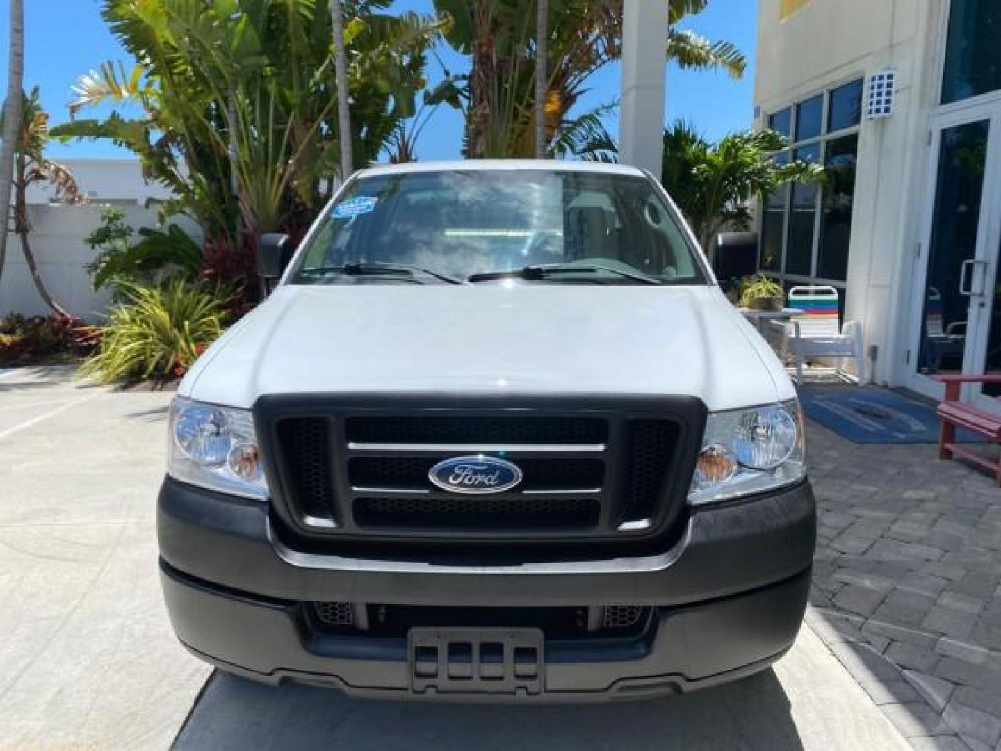 2005 Oxford White /Flint Ford F-150 PU STX LOW MILES 18,931 (1FTRF12215N) with an 4.2L EFI V6 Engine engine, Automatic transmission, located at 4701 North Dixie Hwy, Pompano Beach, FL, 33064, (954) 422-2889, 26.240938, -80.123474 - OUR WEBPAGE FLORIDACARS1.COM HAS OVER 100 PHOTOS AND FREE CARFAX LINK 2005 Ford F-150 STX Pickup 4.2L V6 F OHV Gasoline 20 MPG Rear Wheel Drive Features ABS Brakes Air Conditioning AM/FM Stereo Automatic Transmission Overhead Airbags Side Airbags Traction Control Vinyl Seats 2005 Ford F-150 STX Regu- Photo#2