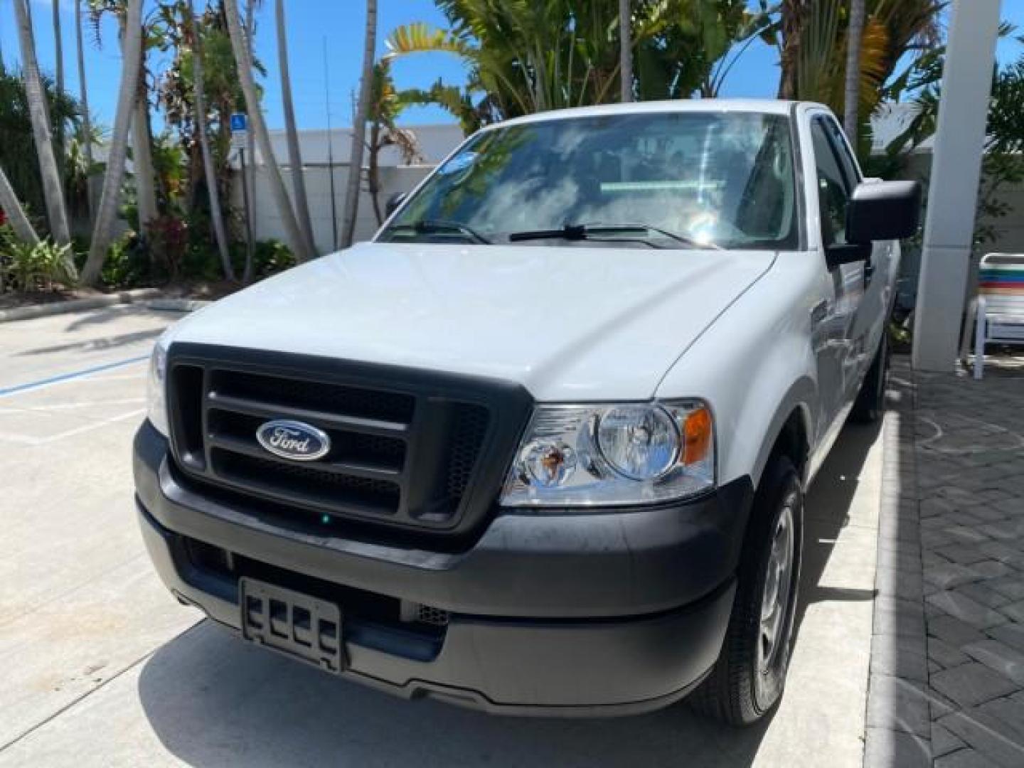 2005 Oxford White /Flint Ford F-150 PU STX LOW MILES 18,931 (1FTRF12215N) with an 4.2L EFI V6 Engine engine, Automatic transmission, located at 4701 North Dixie Hwy, Pompano Beach, FL, 33064, (954) 422-2889, 26.240938, -80.123474 - OUR WEBPAGE FLORIDACARS1.COM HAS OVER 100 PHOTOS AND FREE CARFAX LINK 2005 Ford F-150 STX Pickup 4.2L V6 F OHV Gasoline 20 MPG Rear Wheel Drive Features ABS Brakes Air Conditioning AM/FM Stereo Automatic Transmission Overhead Airbags Side Airbags Traction Control Vinyl Seats 2005 Ford F-150 STX Regu- Photo#3