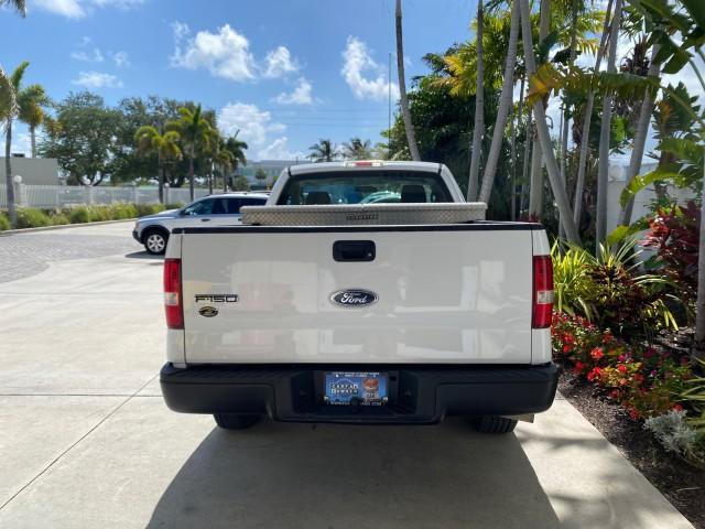 2005 Oxford White /Flint Ford F-150 PU STX LOW MILES 18,931 (1FTRF12215N) with an 4.2L EFI V6 Engine engine, Automatic transmission, located at 4701 North Dixie Hwy, Pompano Beach, FL, 33064, (954) 422-2889, 26.240938, -80.123474 - OUR WEBPAGE FLORIDACARS1.COM HAS OVER 100 PHOTOS AND FREE CARFAX LINK 2005 Ford F-150 STX Pickup 4.2L V6 F OHV Gasoline 20 MPG Rear Wheel Drive Features ABS Brakes Air Conditioning AM/FM Stereo Automatic Transmission Overhead Airbags Side Airbags Traction Control Vinyl Seats 2005 Ford F-150 STX Regu - Photo#6