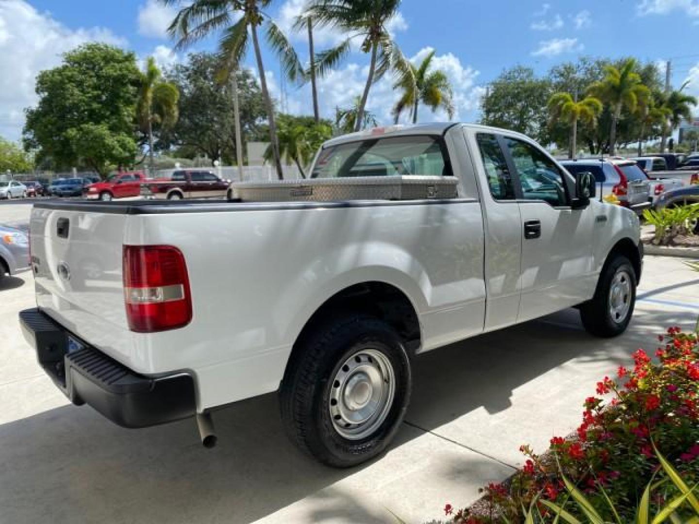 2005 Oxford White /Flint Ford F-150 PU STX LOW MILES 18,931 (1FTRF12215N) with an 4.2L EFI V6 Engine engine, Automatic transmission, located at 4701 North Dixie Hwy, Pompano Beach, FL, 33064, (954) 422-2889, 26.240938, -80.123474 - OUR WEBPAGE FLORIDACARS1.COM HAS OVER 100 PHOTOS AND FREE CARFAX LINK 2005 Ford F-150 STX Pickup 4.2L V6 F OHV Gasoline 20 MPG Rear Wheel Drive Features ABS Brakes Air Conditioning AM/FM Stereo Automatic Transmission Overhead Airbags Side Airbags Traction Control Vinyl Seats 2005 Ford F-150 STX Regu- Photo#7