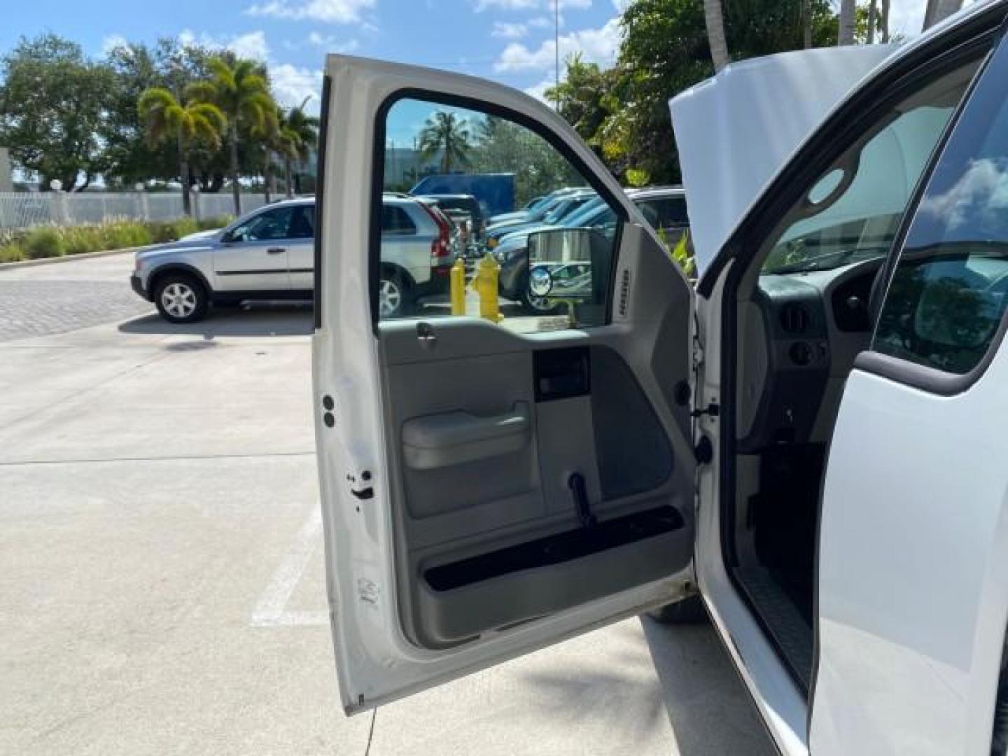 2005 Oxford White /Flint Ford F-150 PU STX LOW MILES 18,931 (1FTRF12215N) with an 4.2L EFI V6 Engine engine, Automatic transmission, located at 4701 North Dixie Hwy, Pompano Beach, FL, 33064, (954) 422-2889, 26.240938, -80.123474 - OUR WEBPAGE FLORIDACARS1.COM HAS OVER 100 PHOTOS AND FREE CARFAX LINK 2005 Ford F-150 STX Pickup 4.2L V6 F OHV Gasoline 20 MPG Rear Wheel Drive Features ABS Brakes Air Conditioning AM/FM Stereo Automatic Transmission Overhead Airbags Side Airbags Traction Control Vinyl Seats 2005 Ford F-150 STX Regu- Photo#9