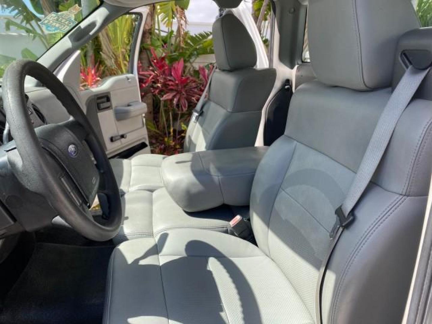 2005 Oxford White /Flint Ford F-150 PU STX LOW MILES 18,931 (1FTRF12215N) with an 4.2L EFI V6 Engine engine, Automatic transmission, located at 4701 North Dixie Hwy, Pompano Beach, FL, 33064, (954) 422-2889, 26.240938, -80.123474 - OUR WEBPAGE FLORIDACARS1.COM HAS OVER 100 PHOTOS AND FREE CARFAX LINK 2005 Ford F-150 STX Pickup 4.2L V6 F OHV Gasoline 20 MPG Rear Wheel Drive Features ABS Brakes Air Conditioning AM/FM Stereo Automatic Transmission Overhead Airbags Side Airbags Traction Control Vinyl Seats 2005 Ford F-150 STX Regu- Photo#10