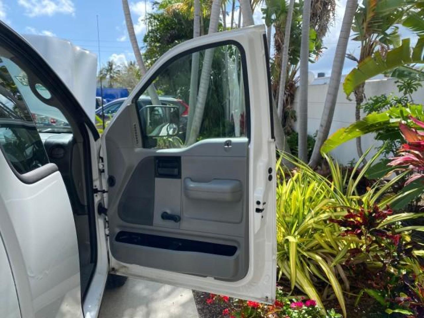 2005 Oxford White /Flint Ford F-150 PU STX LOW MILES 18,931 (1FTRF12215N) with an 4.2L EFI V6 Engine engine, Automatic transmission, located at 4701 North Dixie Hwy, Pompano Beach, FL, 33064, (954) 422-2889, 26.240938, -80.123474 - OUR WEBPAGE FLORIDACARS1.COM HAS OVER 100 PHOTOS AND FREE CARFAX LINK 2005 Ford F-150 STX Pickup 4.2L V6 F OHV Gasoline 20 MPG Rear Wheel Drive Features ABS Brakes Air Conditioning AM/FM Stereo Automatic Transmission Overhead Airbags Side Airbags Traction Control Vinyl Seats 2005 Ford F-150 STX Regu- Photo#11