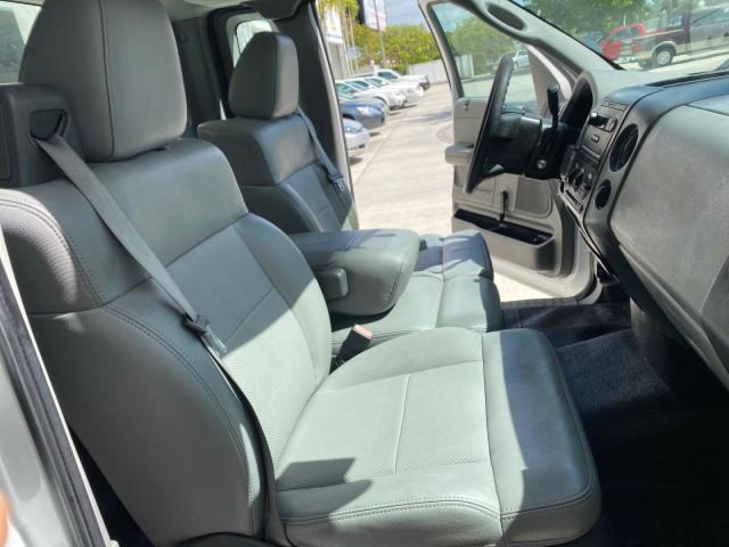 2005 Oxford White /Flint Ford F-150 PU STX LOW MILES 18,931 (1FTRF12215N) with an 4.2L EFI V6 Engine engine, Automatic transmission, located at 4701 North Dixie Hwy, Pompano Beach, FL, 33064, (954) 422-2889, 26.240938, -80.123474 - OUR WEBPAGE FLORIDACARS1.COM HAS OVER 100 PHOTOS AND FREE CARFAX LINK 2005 Ford F-150 STX Pickup 4.2L V6 F OHV Gasoline 20 MPG Rear Wheel Drive Features ABS Brakes Air Conditioning AM/FM Stereo Automatic Transmission Overhead Airbags Side Airbags Traction Control Vinyl Seats 2005 Ford F-150 STX Regu- Photo#12