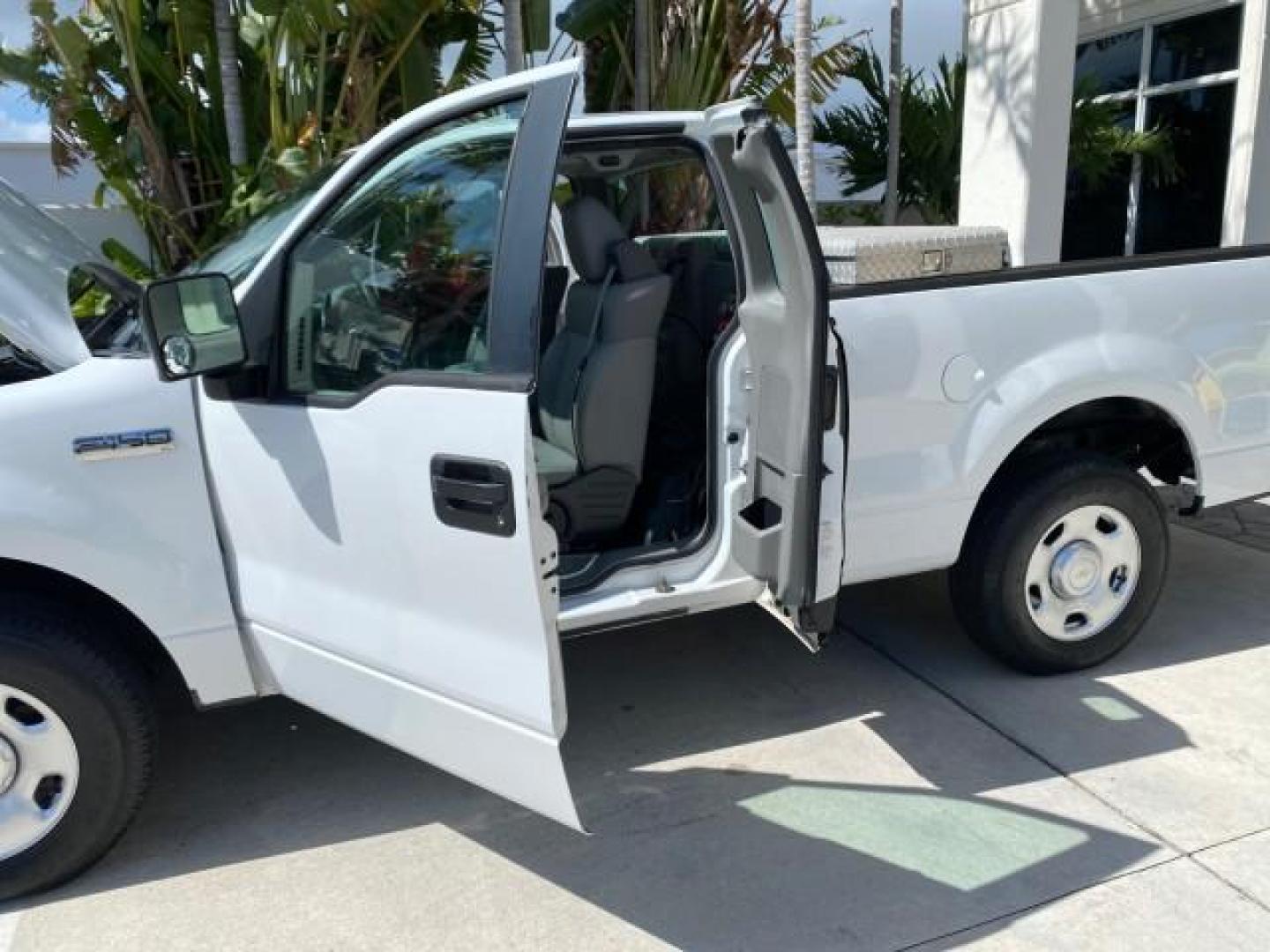 2005 Oxford White /Flint Ford F-150 PU STX LOW MILES 18,931 (1FTRF12215N) with an 4.2L EFI V6 Engine engine, Automatic transmission, located at 4701 North Dixie Hwy, Pompano Beach, FL, 33064, (954) 422-2889, 26.240938, -80.123474 - OUR WEBPAGE FLORIDACARS1.COM HAS OVER 100 PHOTOS AND FREE CARFAX LINK 2005 Ford F-150 STX Pickup 4.2L V6 F OHV Gasoline 20 MPG Rear Wheel Drive Features ABS Brakes Air Conditioning AM/FM Stereo Automatic Transmission Overhead Airbags Side Airbags Traction Control Vinyl Seats 2005 Ford F-150 STX Regu- Photo#13