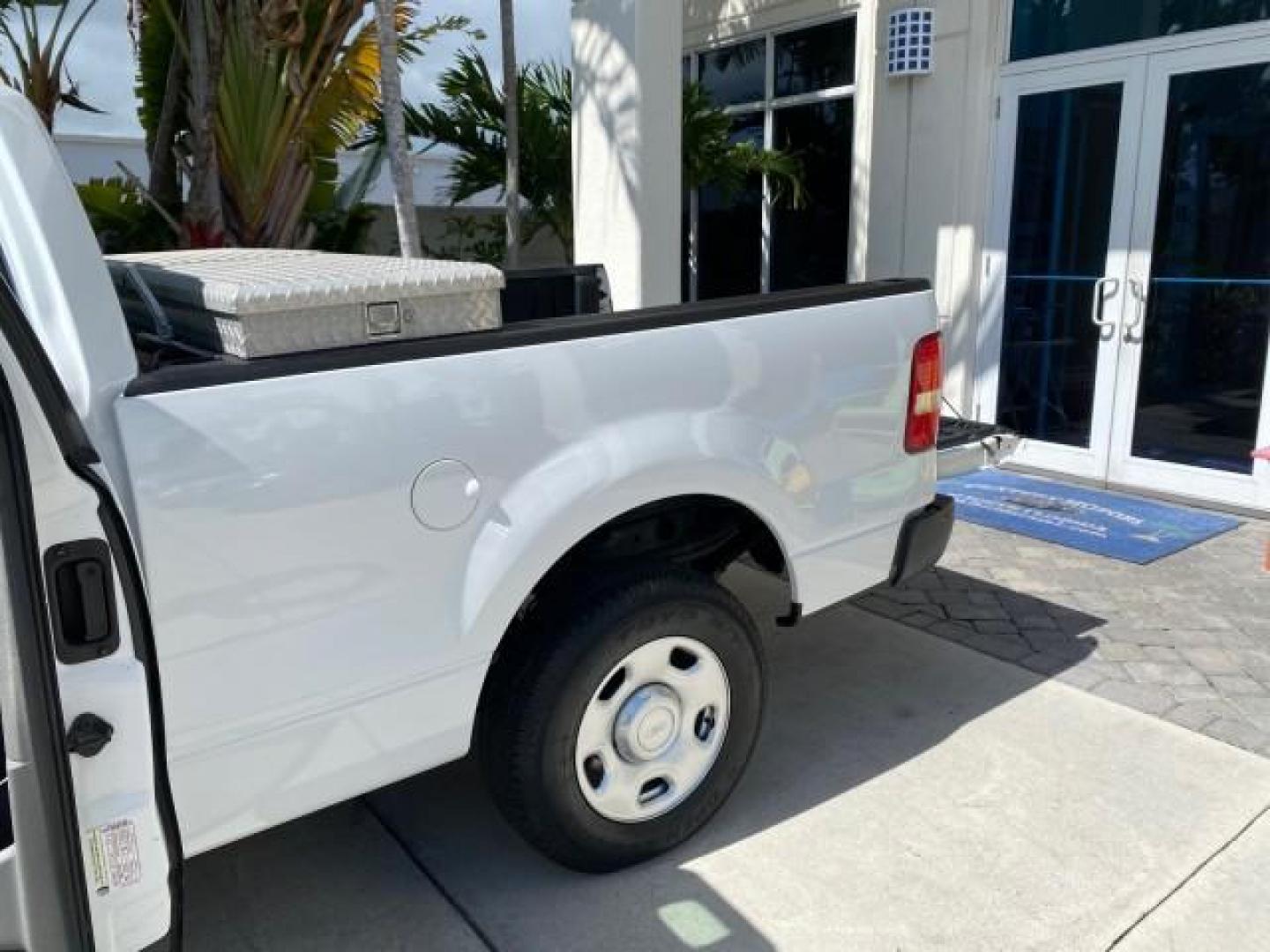 2005 Oxford White /Flint Ford F-150 PU STX LOW MILES 18,931 (1FTRF12215N) with an 4.2L EFI V6 Engine engine, Automatic transmission, located at 4701 North Dixie Hwy, Pompano Beach, FL, 33064, (954) 422-2889, 26.240938, -80.123474 - OUR WEBPAGE FLORIDACARS1.COM HAS OVER 100 PHOTOS AND FREE CARFAX LINK 2005 Ford F-150 STX Pickup 4.2L V6 F OHV Gasoline 20 MPG Rear Wheel Drive Features ABS Brakes Air Conditioning AM/FM Stereo Automatic Transmission Overhead Airbags Side Airbags Traction Control Vinyl Seats 2005 Ford F-150 STX Regu- Photo#14