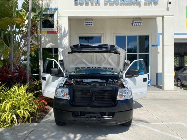 2005 Oxford White /Flint Ford F-150 PU STX LOW MILES 18,931 (1FTRF12215N) with an 4.2L EFI V6 Engine engine, Automatic transmission, located at 4701 North Dixie Hwy, Pompano Beach, FL, 33064, (954) 422-2889, 26.240938, -80.123474 - OUR WEBPAGE FLORIDACARS1.COM HAS OVER 100 PHOTOS AND FREE CARFAX LINK 2005 Ford F-150 STX Pickup 4.2L V6 F OHV Gasoline 20 MPG Rear Wheel Drive Features ABS Brakes Air Conditioning AM/FM Stereo Automatic Transmission Overhead Airbags Side Airbags Traction Control Vinyl Seats 2005 Ford F-150 STX Regu - Photo#16