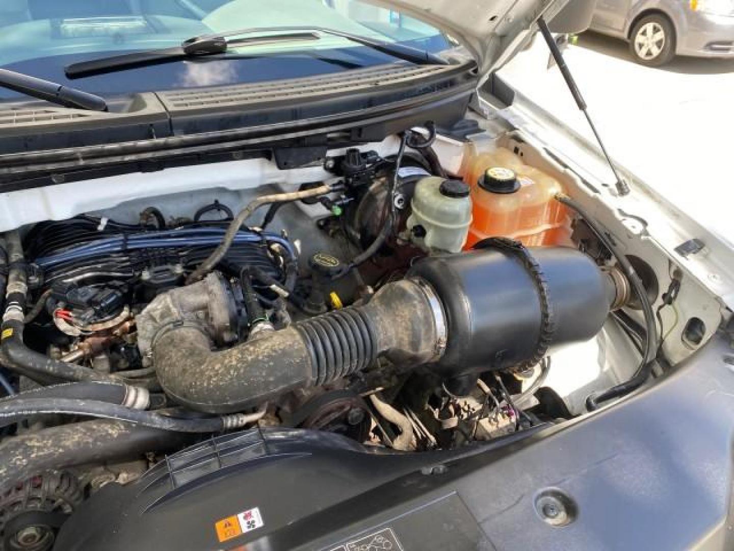 2005 Oxford White /Flint Ford F-150 PU STX LOW MILES 18,931 (1FTRF12215N) with an 4.2L EFI V6 Engine engine, Automatic transmission, located at 4701 North Dixie Hwy, Pompano Beach, FL, 33064, (954) 422-2889, 26.240938, -80.123474 - OUR WEBPAGE FLORIDACARS1.COM HAS OVER 100 PHOTOS AND FREE CARFAX LINK 2005 Ford F-150 STX Pickup 4.2L V6 F OHV Gasoline 20 MPG Rear Wheel Drive Features ABS Brakes Air Conditioning AM/FM Stereo Automatic Transmission Overhead Airbags Side Airbags Traction Control Vinyl Seats 2005 Ford F-150 STX Regu- Photo#25
