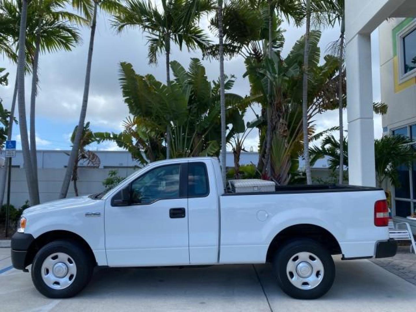 2005 Oxford White /Flint Ford F-150 PU STX LOW MILES 18,931 (1FTRF12215N) with an 4.2L EFI V6 Engine engine, Automatic transmission, located at 4701 North Dixie Hwy, Pompano Beach, FL, 33064, (954) 422-2889, 26.240938, -80.123474 - OUR WEBPAGE FLORIDACARS1.COM HAS OVER 100 PHOTOS AND FREE CARFAX LINK 2005 Ford F-150 STX Pickup 4.2L V6 F OHV Gasoline 20 MPG Rear Wheel Drive Features ABS Brakes Air Conditioning AM/FM Stereo Automatic Transmission Overhead Airbags Side Airbags Traction Control Vinyl Seats 2005 Ford F-150 STX Regu- Photo#31