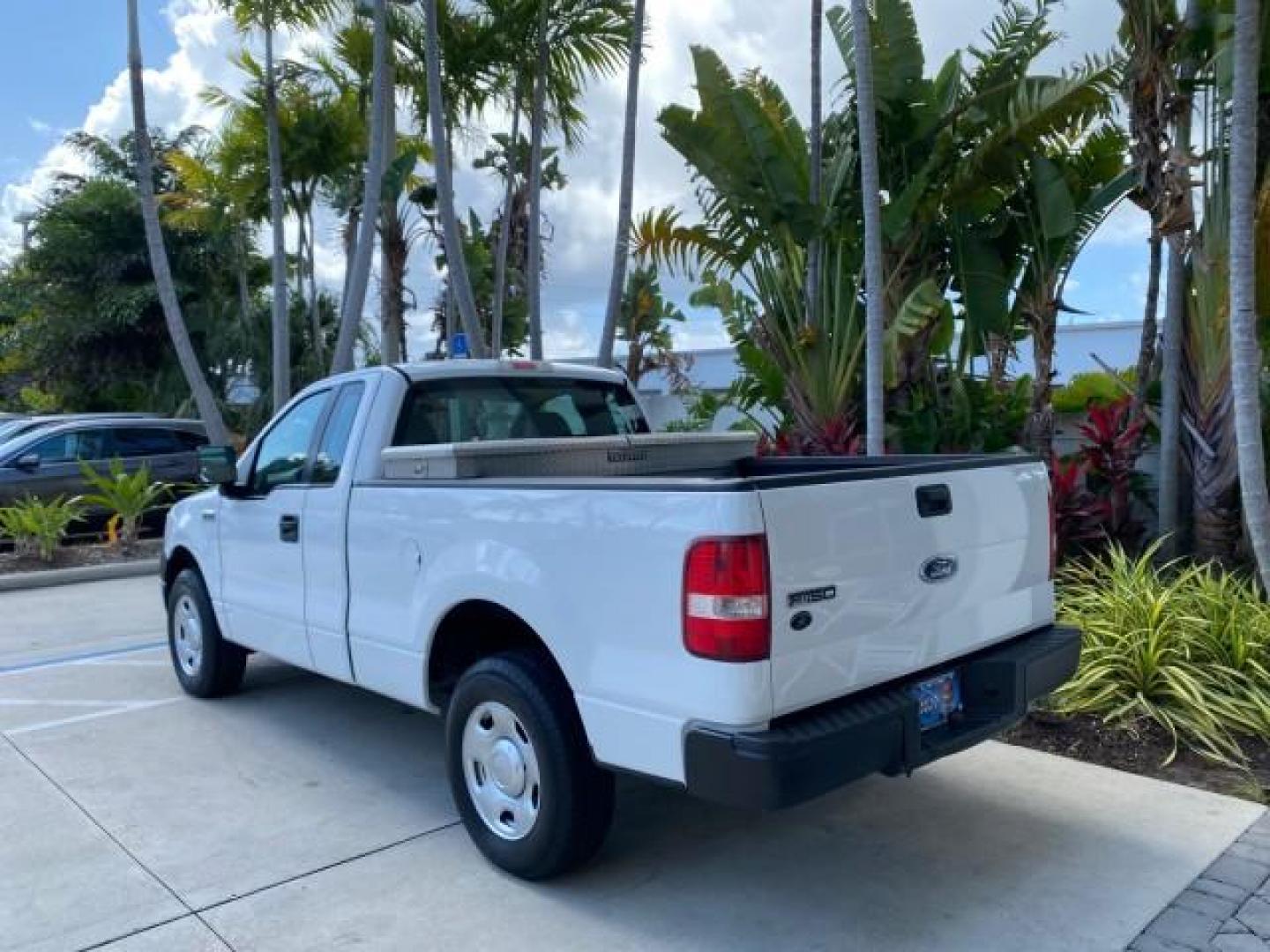 2005 Oxford White /Flint Ford F-150 PU STX LOW MILES 18,931 (1FTRF12215N) with an 4.2L EFI V6 Engine engine, Automatic transmission, located at 4701 North Dixie Hwy, Pompano Beach, FL, 33064, (954) 422-2889, 26.240938, -80.123474 - OUR WEBPAGE FLORIDACARS1.COM HAS OVER 100 PHOTOS AND FREE CARFAX LINK 2005 Ford F-150 STX Pickup 4.2L V6 F OHV Gasoline 20 MPG Rear Wheel Drive Features ABS Brakes Air Conditioning AM/FM Stereo Automatic Transmission Overhead Airbags Side Airbags Traction Control Vinyl Seats 2005 Ford F-150 STX Regu- Photo#32