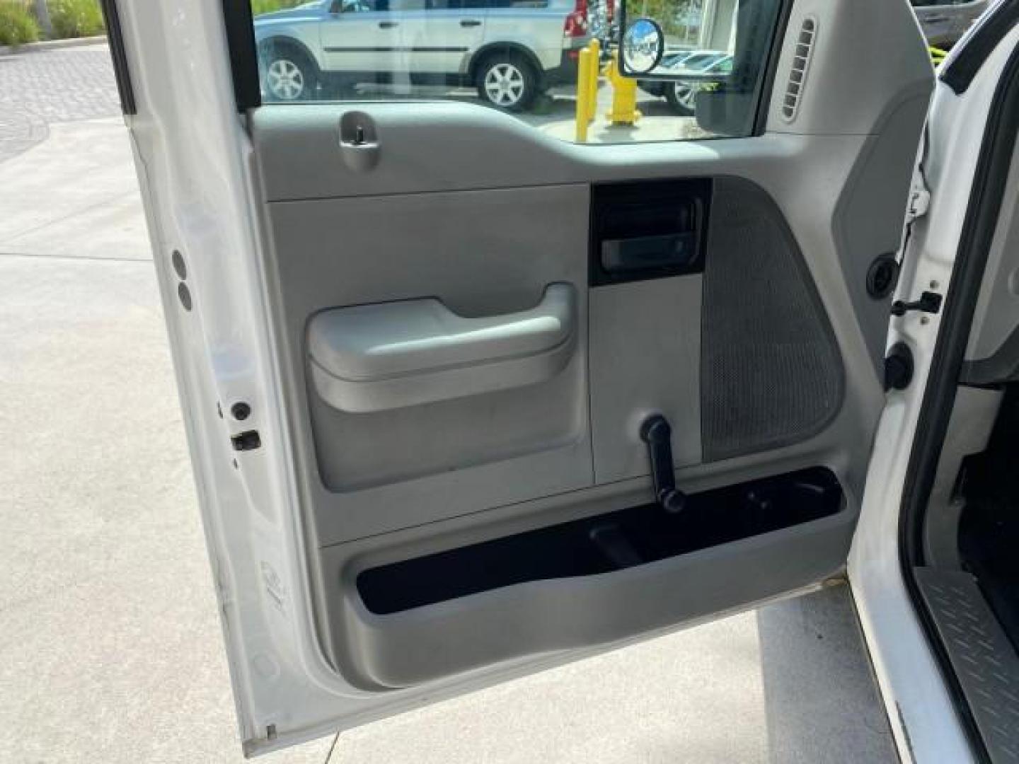 2005 Oxford White /Flint Ford F-150 PU STX LOW MILES 18,931 (1FTRF12215N) with an 4.2L EFI V6 Engine engine, Automatic transmission, located at 4701 North Dixie Hwy, Pompano Beach, FL, 33064, (954) 422-2889, 26.240938, -80.123474 - OUR WEBPAGE FLORIDACARS1.COM HAS OVER 100 PHOTOS AND FREE CARFAX LINK 2005 Ford F-150 STX Pickup 4.2L V6 F OHV Gasoline 20 MPG Rear Wheel Drive Features ABS Brakes Air Conditioning AM/FM Stereo Automatic Transmission Overhead Airbags Side Airbags Traction Control Vinyl Seats 2005 Ford F-150 STX Regu- Photo#41