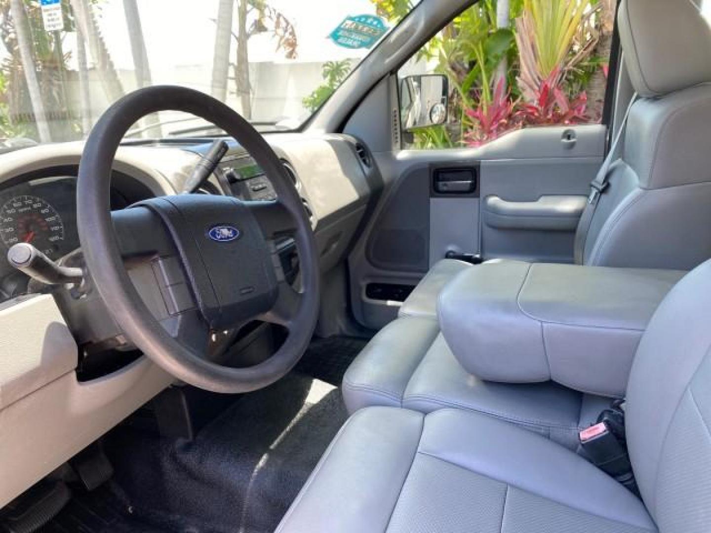 2005 Oxford White /Flint Ford F-150 PU STX LOW MILES 18,931 (1FTRF12215N) with an 4.2L EFI V6 Engine engine, Automatic transmission, located at 4701 North Dixie Hwy, Pompano Beach, FL, 33064, (954) 422-2889, 26.240938, -80.123474 - OUR WEBPAGE FLORIDACARS1.COM HAS OVER 100 PHOTOS AND FREE CARFAX LINK 2005 Ford F-150 STX Pickup 4.2L V6 F OHV Gasoline 20 MPG Rear Wheel Drive Features ABS Brakes Air Conditioning AM/FM Stereo Automatic Transmission Overhead Airbags Side Airbags Traction Control Vinyl Seats 2005 Ford F-150 STX Regu- Photo#43