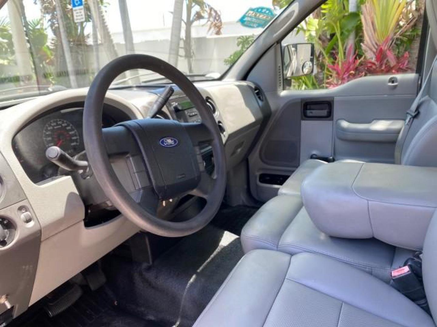 2005 Oxford White /Flint Ford F-150 PU STX LOW MILES 18,931 (1FTRF12215N) with an 4.2L EFI V6 Engine engine, Automatic transmission, located at 4701 North Dixie Hwy, Pompano Beach, FL, 33064, (954) 422-2889, 26.240938, -80.123474 - OUR WEBPAGE FLORIDACARS1.COM HAS OVER 100 PHOTOS AND FREE CARFAX LINK 2005 Ford F-150 STX Pickup 4.2L V6 F OHV Gasoline 20 MPG Rear Wheel Drive Features ABS Brakes Air Conditioning AM/FM Stereo Automatic Transmission Overhead Airbags Side Airbags Traction Control Vinyl Seats 2005 Ford F-150 STX Regu- Photo#44