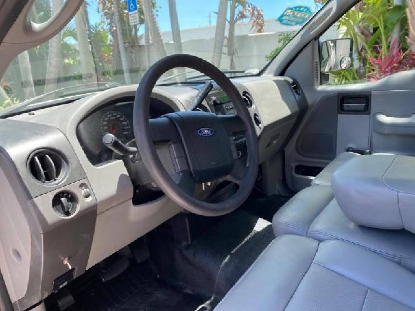 2005 Oxford White /Flint Ford F-150 PU STX LOW MILES 18,931 (1FTRF12215N) with an 4.2L EFI V6 Engine engine, Automatic transmission, located at 4701 North Dixie Hwy, Pompano Beach, FL, 33064, (954) 422-2889, 26.240938, -80.123474 - OUR WEBPAGE FLORIDACARS1.COM HAS OVER 100 PHOTOS AND FREE CARFAX LINK 2005 Ford F-150 STX Pickup 4.2L V6 F OHV Gasoline 20 MPG Rear Wheel Drive Features ABS Brakes Air Conditioning AM/FM Stereo Automatic Transmission Overhead Airbags Side Airbags Traction Control Vinyl Seats 2005 Ford F-150 STX Regu- Photo#45