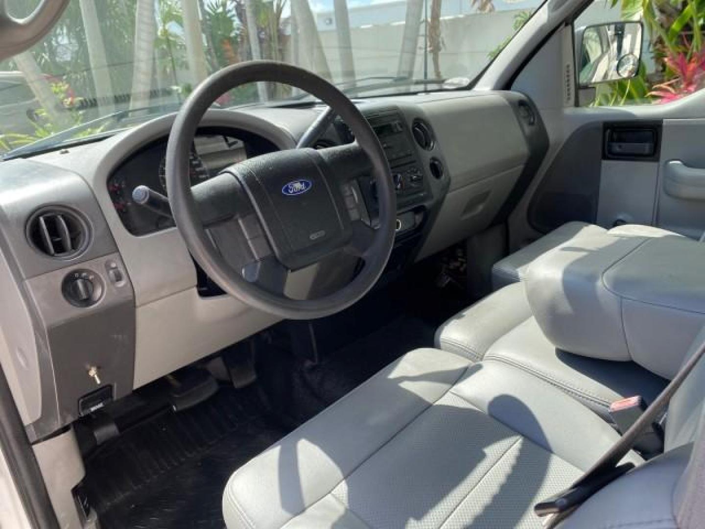 2005 Oxford White /Flint Ford F-150 PU STX LOW MILES 18,931 (1FTRF12215N) with an 4.2L EFI V6 Engine engine, Automatic transmission, located at 4701 North Dixie Hwy, Pompano Beach, FL, 33064, (954) 422-2889, 26.240938, -80.123474 - OUR WEBPAGE FLORIDACARS1.COM HAS OVER 100 PHOTOS AND FREE CARFAX LINK 2005 Ford F-150 STX Pickup 4.2L V6 F OHV Gasoline 20 MPG Rear Wheel Drive Features ABS Brakes Air Conditioning AM/FM Stereo Automatic Transmission Overhead Airbags Side Airbags Traction Control Vinyl Seats 2005 Ford F-150 STX Regu- Photo#48